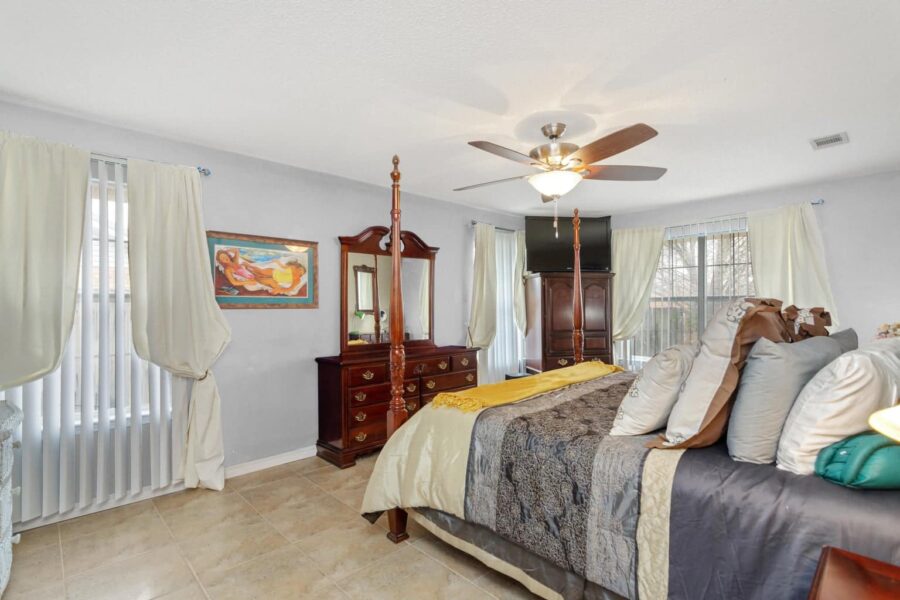 I had my photographer use virtual staging to change the color of this bedroom from bright blue to light gray.